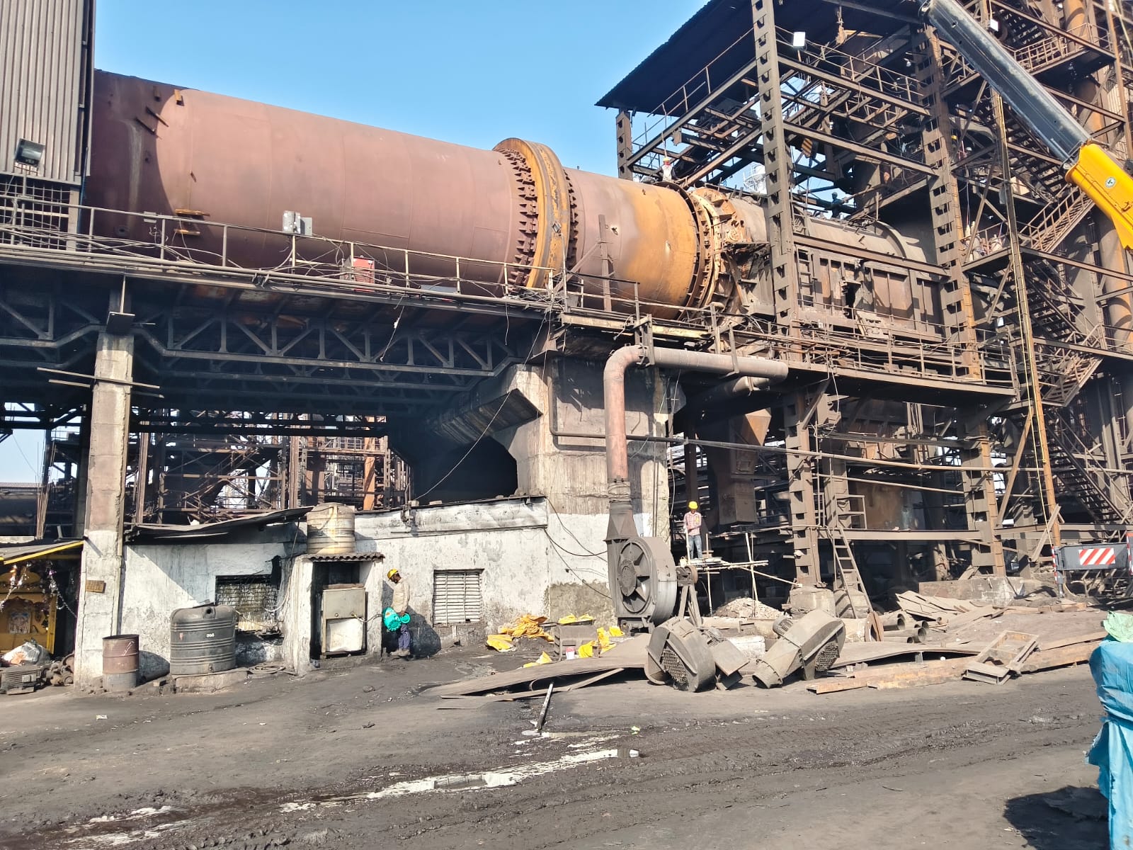 Rotary kiln system for direct reduction of iron ore in steel manufacturing
