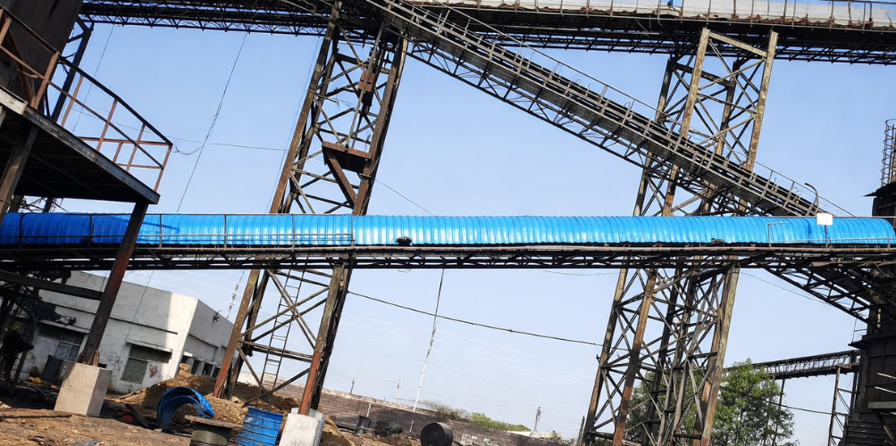 Rotary kiln system for direct reduction of iron ore in steel manufacturing